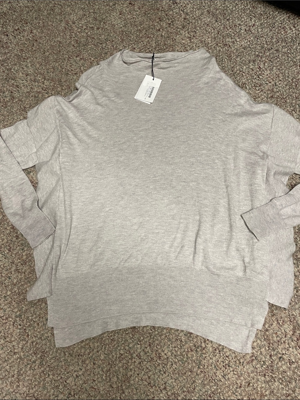 Melissa Nepton Light grey high mock neck Knit Sweater with ruffle sleeves